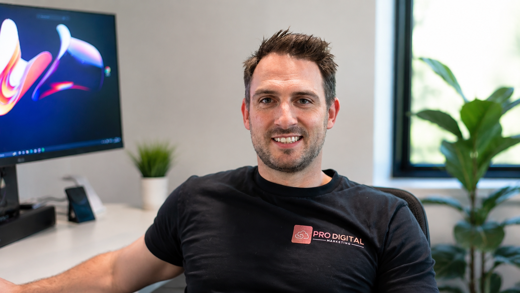 Jarom, founder of Pro Digital, at his desk